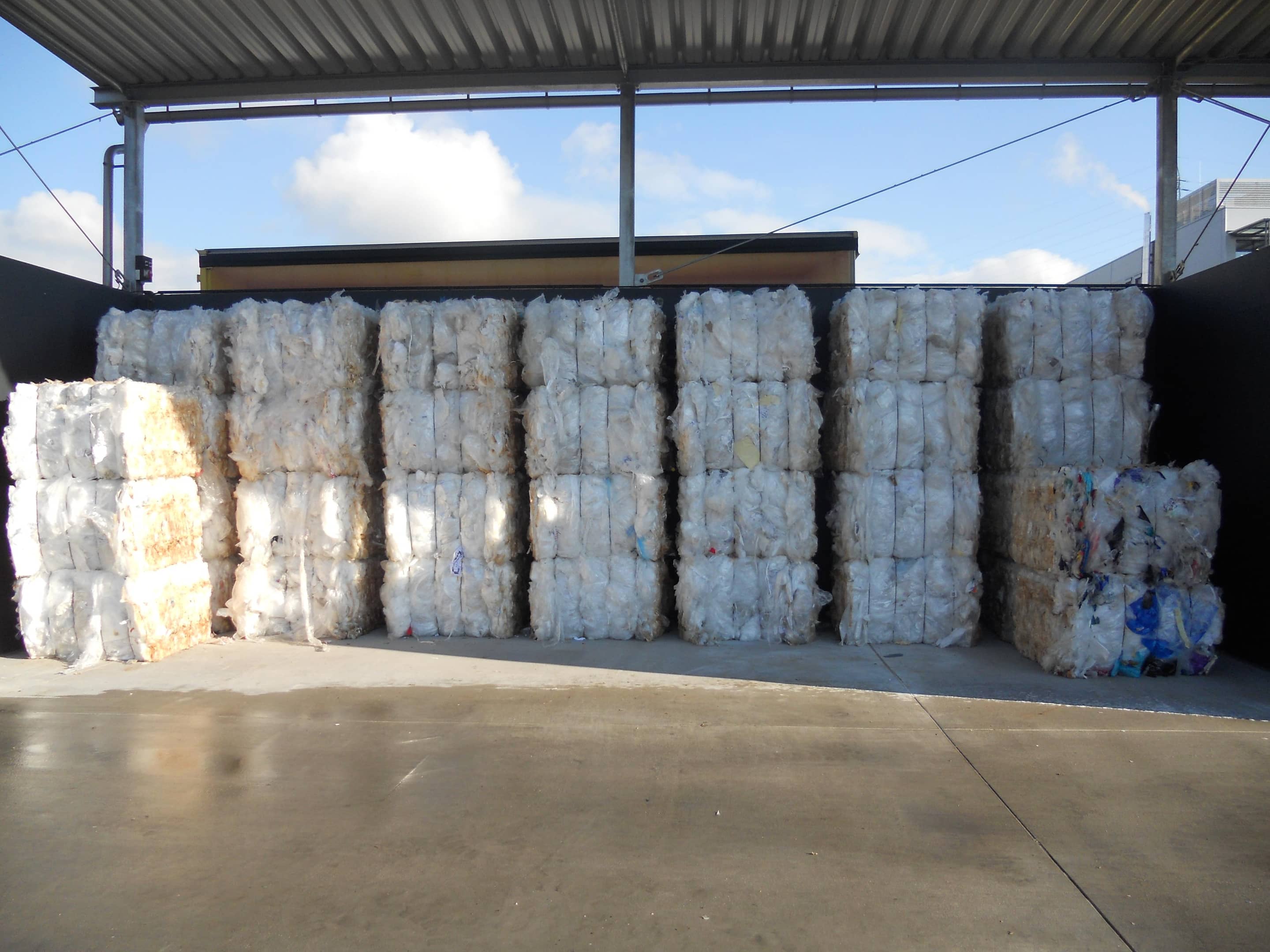 Austropressen channel baling press plastic bales